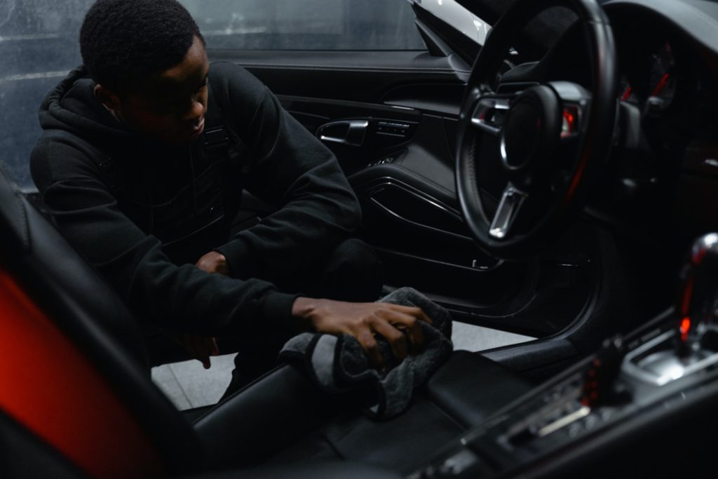 Sponge Car - A Man Cleaning the Interior of the Car